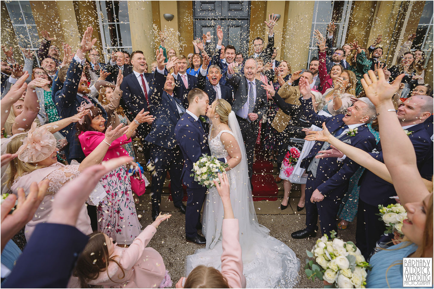 Confetti wedding photo at Rudding Park between Leeds and Harrogate by Yorkshire wedding photographer Barnaby Aldrick