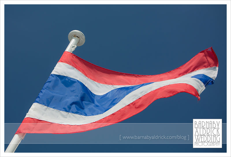 A thai flag at a destination wedding at Santhiya Resort and Spa in Koh Phangan in the gulf of Thailand