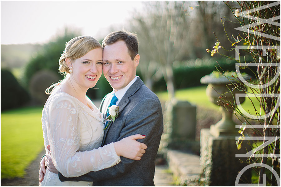 A relaxed wedding photo of a bride and groom at Wood Hall Hotel and Spa near Wetherby in North Yorkshire