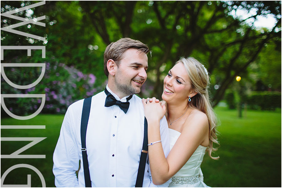 A relaxed wedding portrait of a bride and groom after their civil ceremony at the stunning wedding venue Rudding Park hotel and spa near Harrogate in Yorkshire