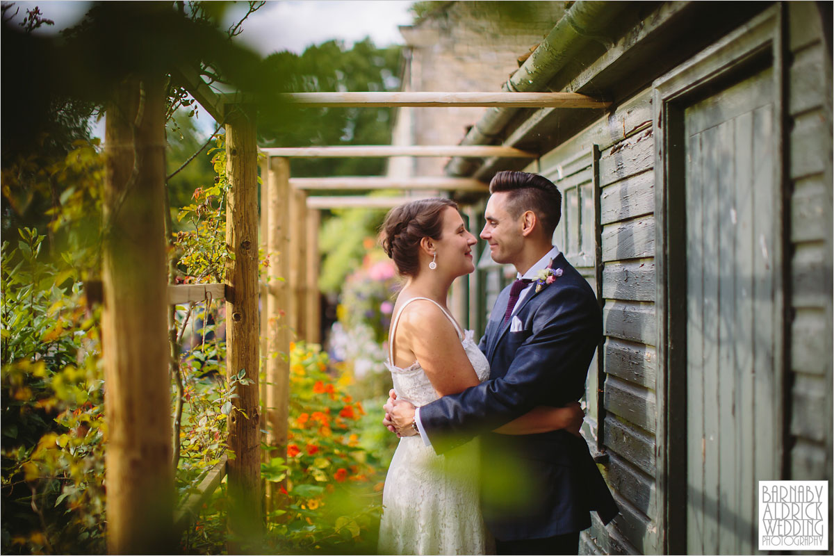 A wedding photo of a couple hugging at The Pheasant Hotel in Harome near Helsmley in North Yorkshire