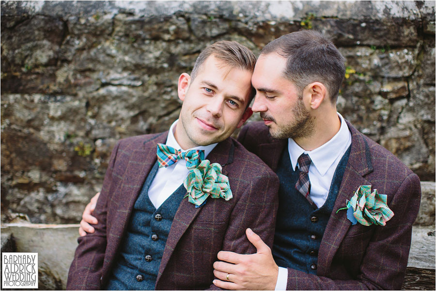 LGBTQ Wedding Photography of two grooms in maroon tweed suits at Tower Hill Barns near Wrexham in Wales