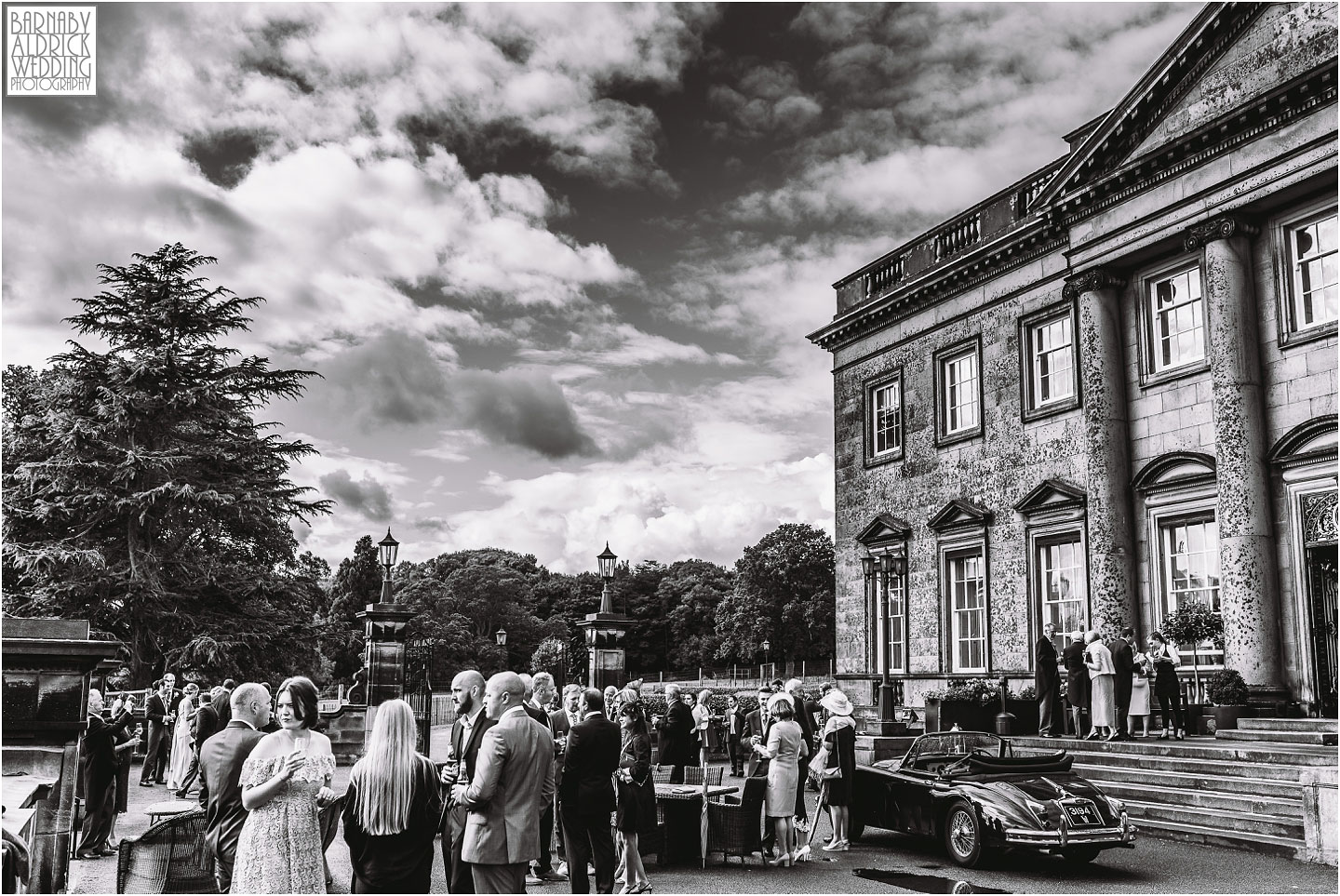 A Wedding photo of guests outside Denton Hall in Ilkley in Yorkshire