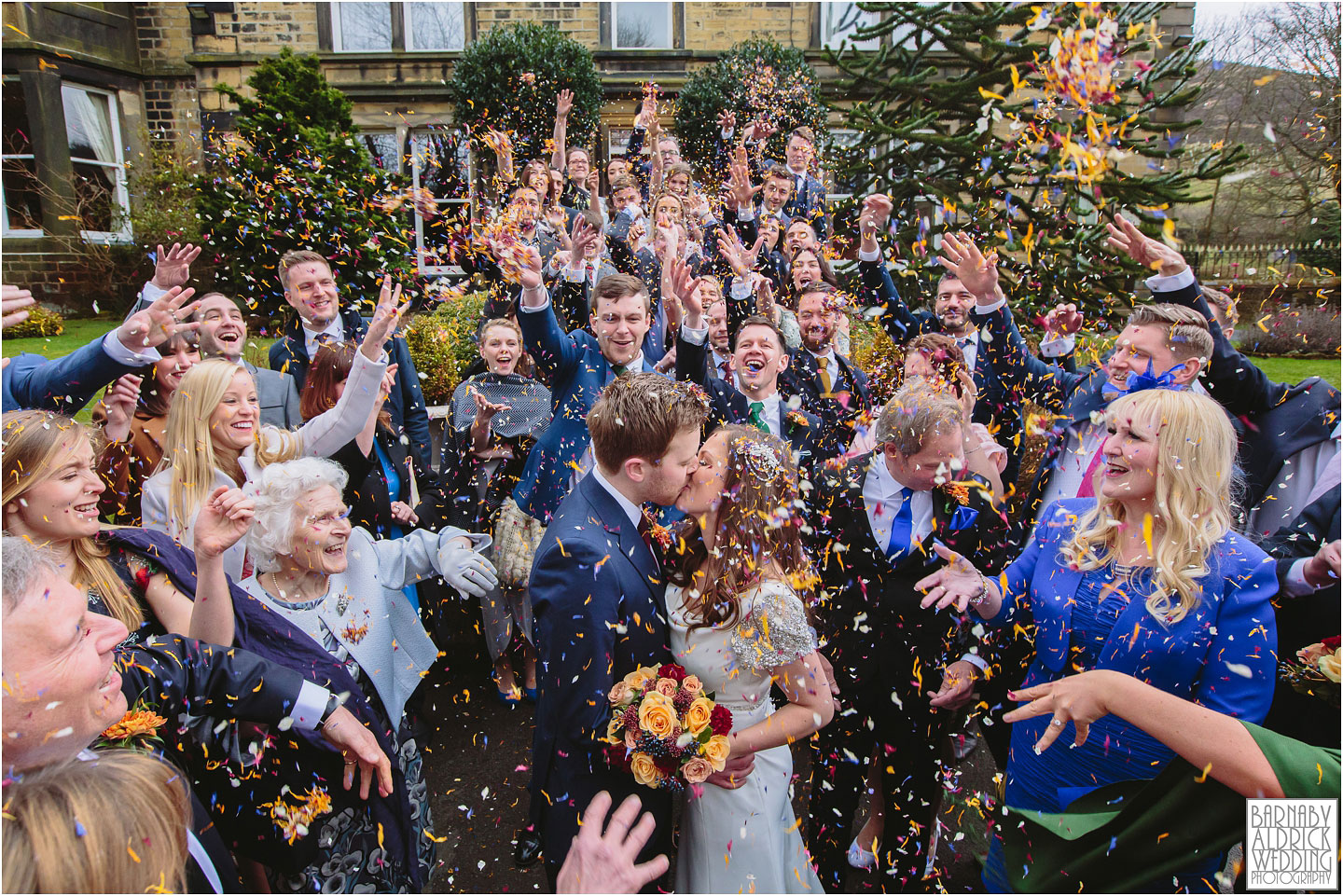 A Crow Hill confetti photograph in Marsden at a Spring Wedding at a West Yorkshire Country House by Photographer Barnaby Aldrick