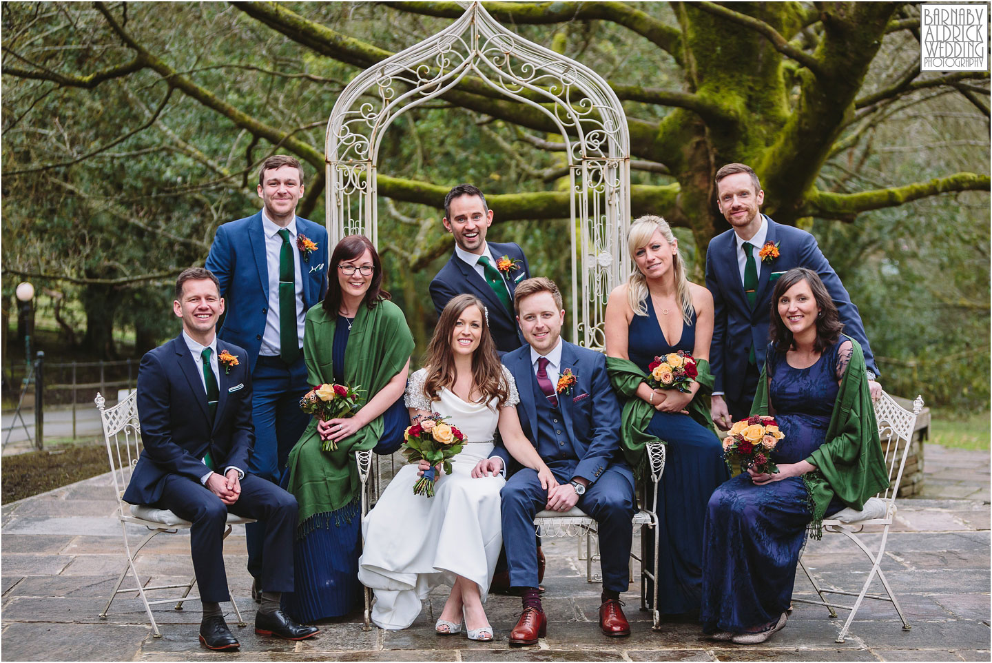 A fun wedding group shot at Crow Hill a Marsden West Yorkshire Country House by Photographer Barnaby Aldrick