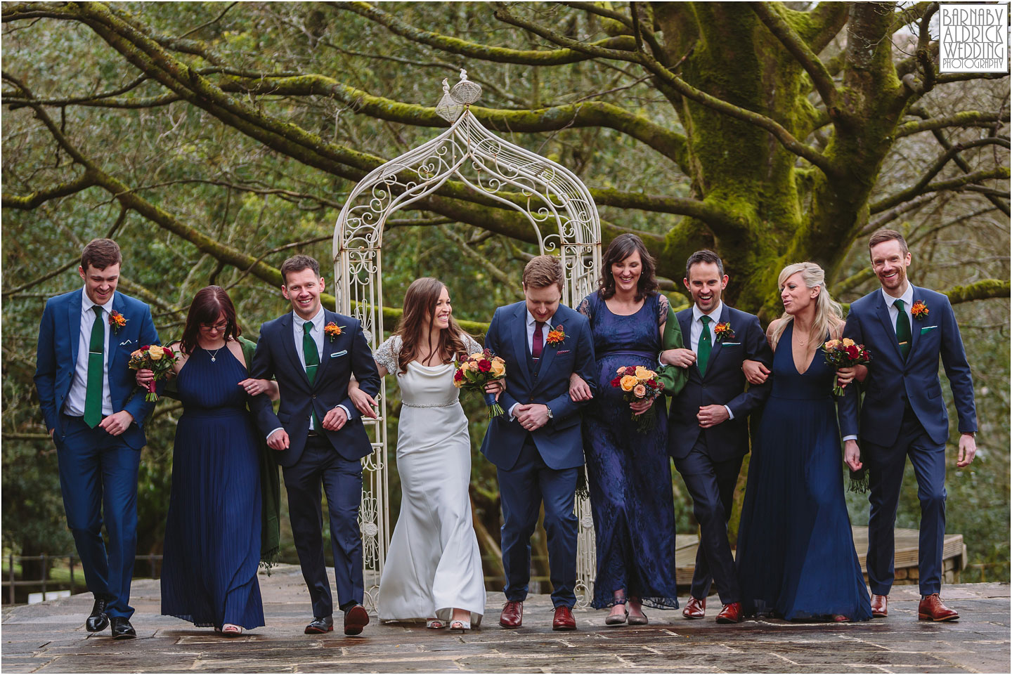 A cool wedding group photograph at Crow Hill a Marsden West Yorkshire Country House by Photographer Barnaby Aldrick