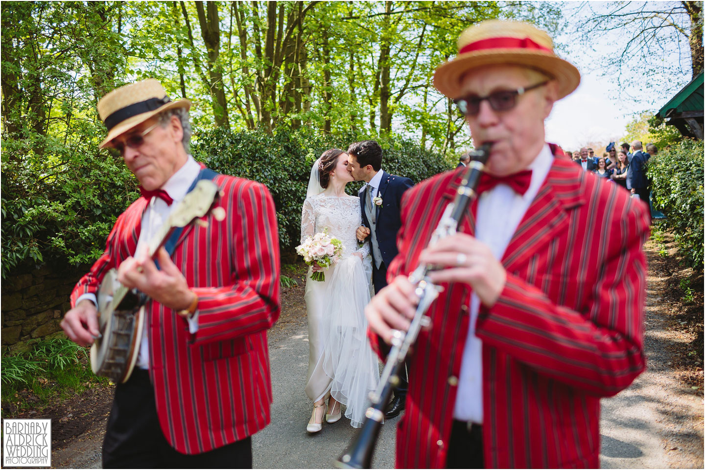 Yorkshire jazz band wedding procession, Denton Hall an exclusive country house in Ilkley in West Yorkshire