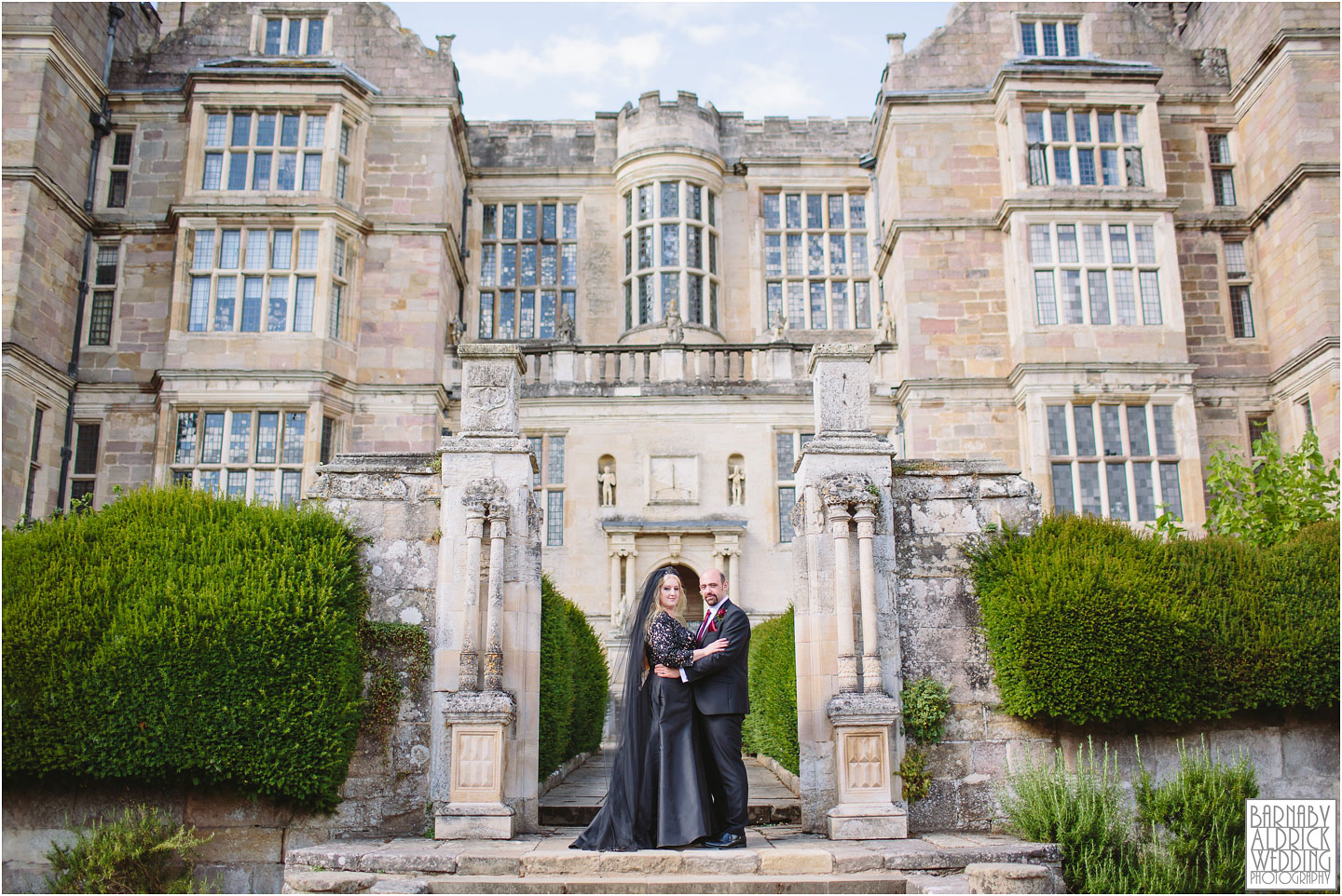 Wedding portrait photo outside Fountain Hall at The National Trust's Fountains Abbey