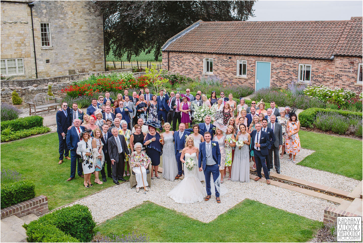 Wedding group shot photo at Priory Cottages Wetherby