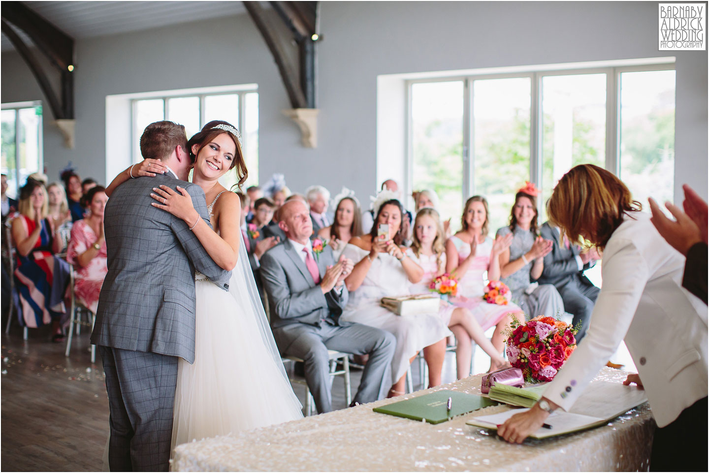 Civil ceremony sealed with a hug at Yorkshire Wedding Barn near Richmond