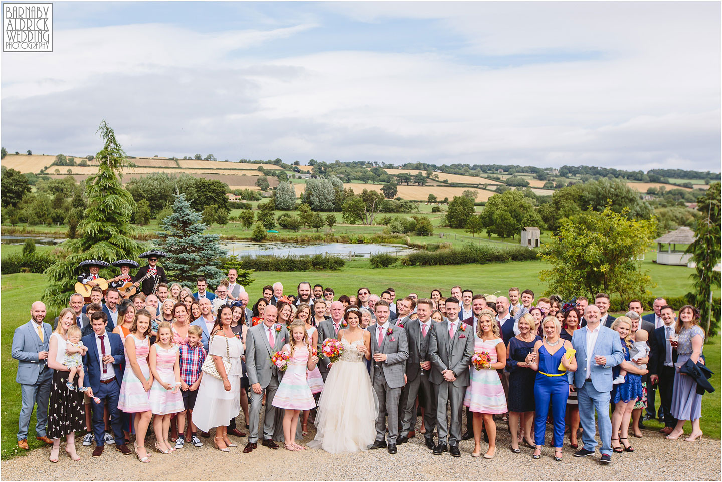 Group photo of all the guests at Yorkshire Wedding Barn near Richmond