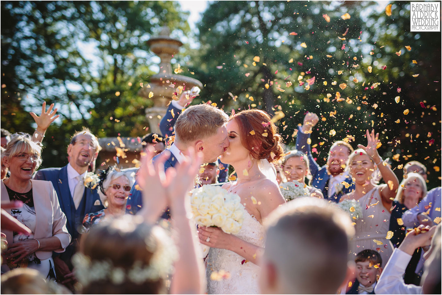 Oulton Hall wedding confetti photographer, autumn wedding photo at Oulton Hall, Leeds wedding venues, West Yorkshire wedding hotels