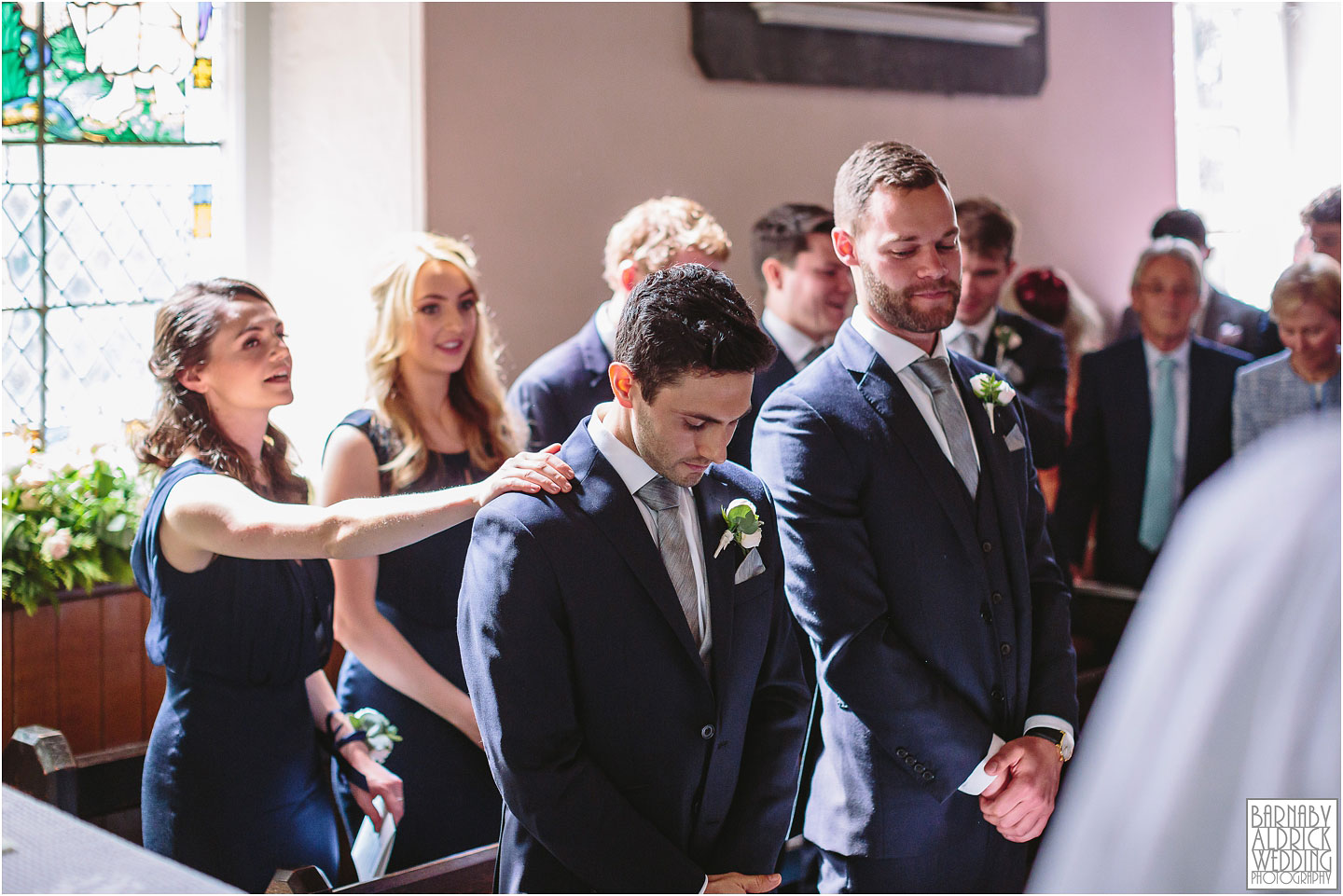 A moment between the groom and his sister before the arrival of the bride at a church in Denton, Amazing Yorkshire Wedding Photos, Best Yorkshire Wedding Photos 2018