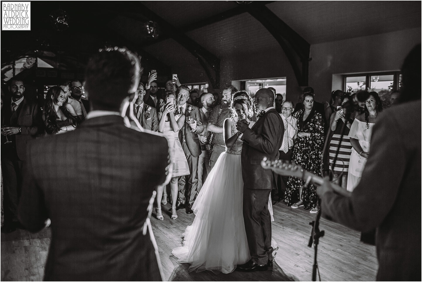 A groom sings while his wife dances at Yorkshire Wedding Barns, Amazing Yorkshire Wedding Photos, Best Yorkshire Wedding Photos 2018