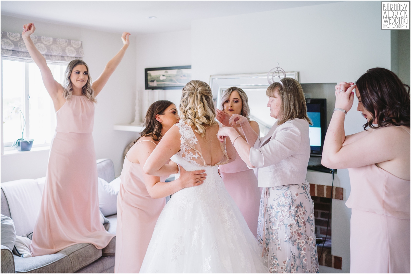 Bride getting into wedding dress, Priory Cottages Wetherby, Wedding venue Yorkshire