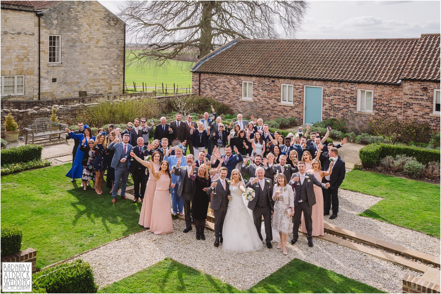 A photo of everyone at Priory Cottages in Yorkshire, Wedding photos at Priory Cottages, Wedding at The Priory Yorkshire