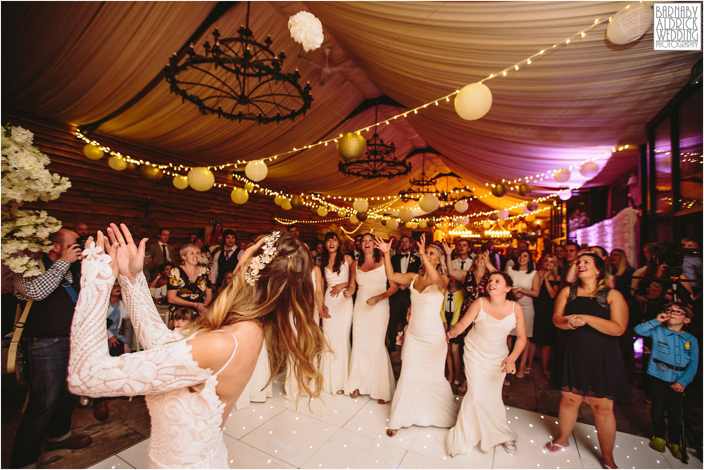 Throwing the bouquet at Hornington Manor, Wedding band at Hornington Manor, Hornington Manor Wedding Photography, Hornington Manor Wedding Photographer, Yorkshire Wedding, Yorkshire Wedding Photographer, York Luxury Barn Wedding Venue, Yorkshire farmhouse Wedding Barn