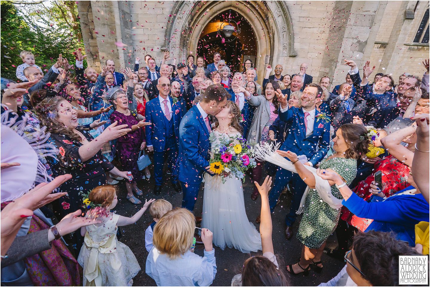 Wedding photos of confetti St Matthews Chapel Allerton, Wedding reception photos at Lineham Farm near Eccup and Arthington on the outskirts of Leeds by Yorkshire Wedding Photographer Barnaby Aldrick