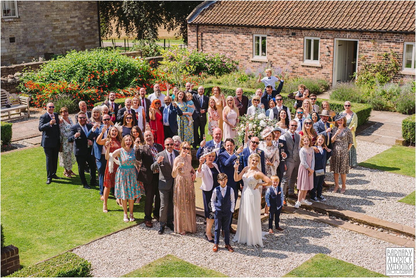 A photo of everyone at Priory Cottages in Yorkshire, Wedding photos at Priory Cottages, Wedding at The Priory Yorkshire