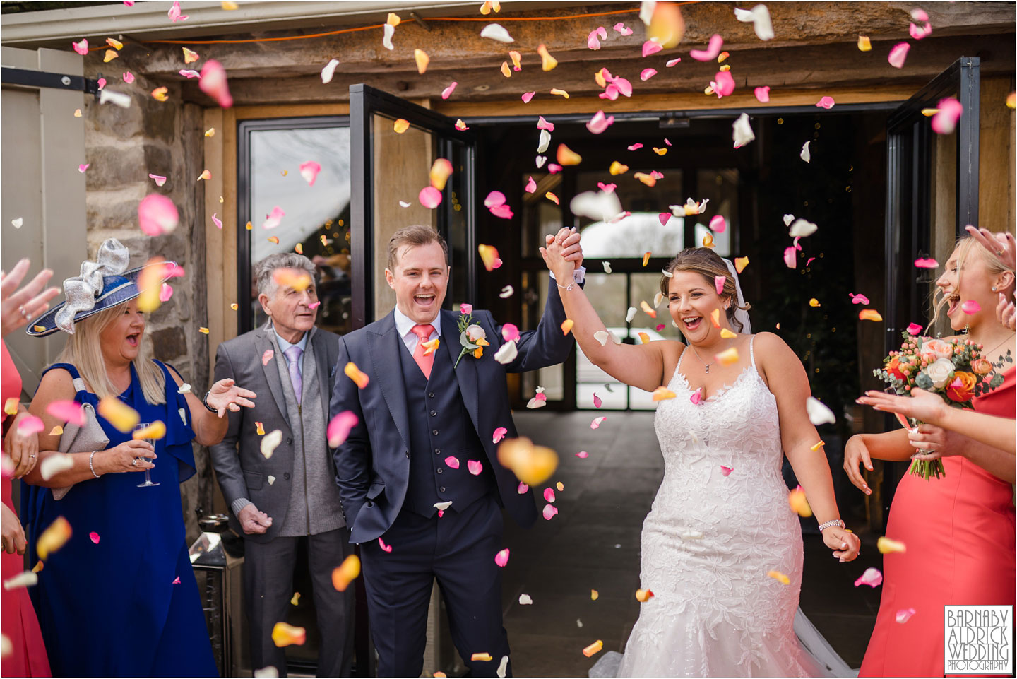 Confetti wedding photo at the Tithe Barn at Bolton Abbey, Tithe Barn Bolton Abbey wedding photos, Tithe Barn Skipton Wedding Photographer, Bolton Abbey Tithe Barn Wedding, Yorkshire Dales Wedding, Yorkshire Dales Wedding Venue, Bolton Abbey wedding, Yorkshire Wedding Photographer